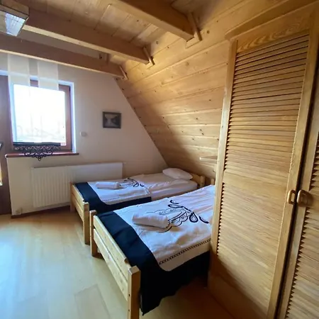 Dom Z Witrazami Quarto em Acomodações Particulares Bukowina Tatrzańska